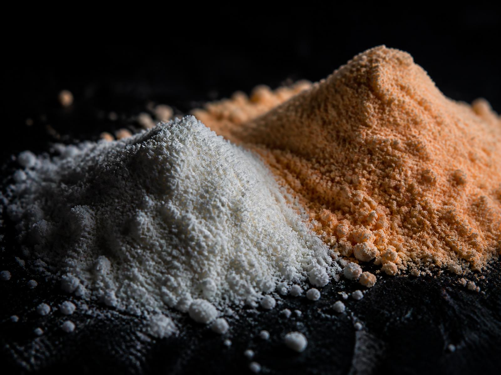 Spray-dried flavor powders under raking light in the Flavor Insights lab